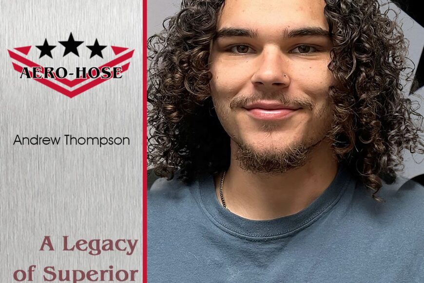 portrait of a young man with curly hair smiling, against a backdrop with the "auto draft" logo and text mentioning andrew thompson and a legacy of service.