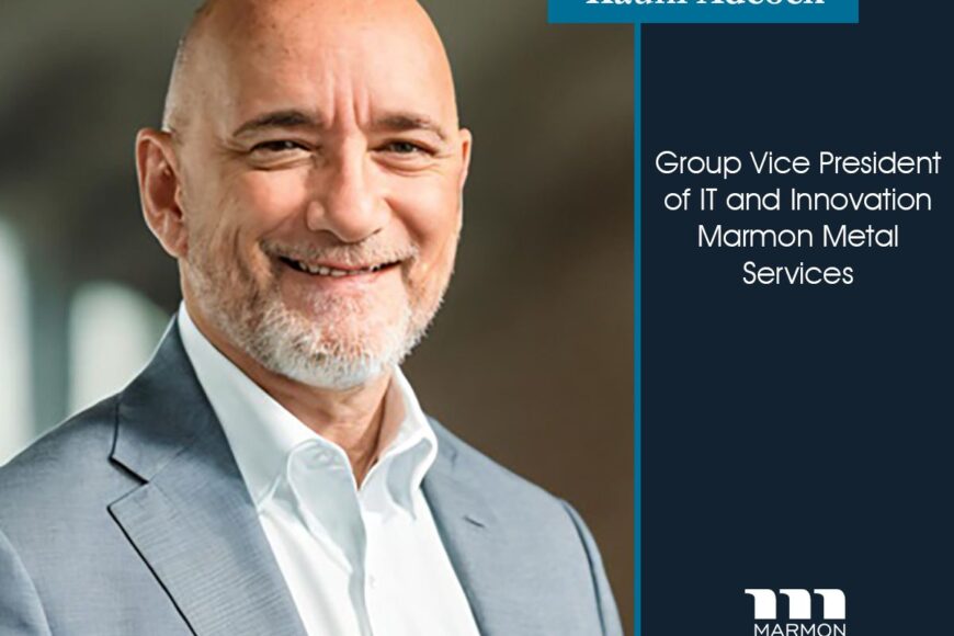 a man in a suit with a shaved head smiles at the camera. text beside him reads "kauhi adcock, group vice president of it and innovation, marmon metal services." the marmon metal services logo and an auto draft banner are displayed.