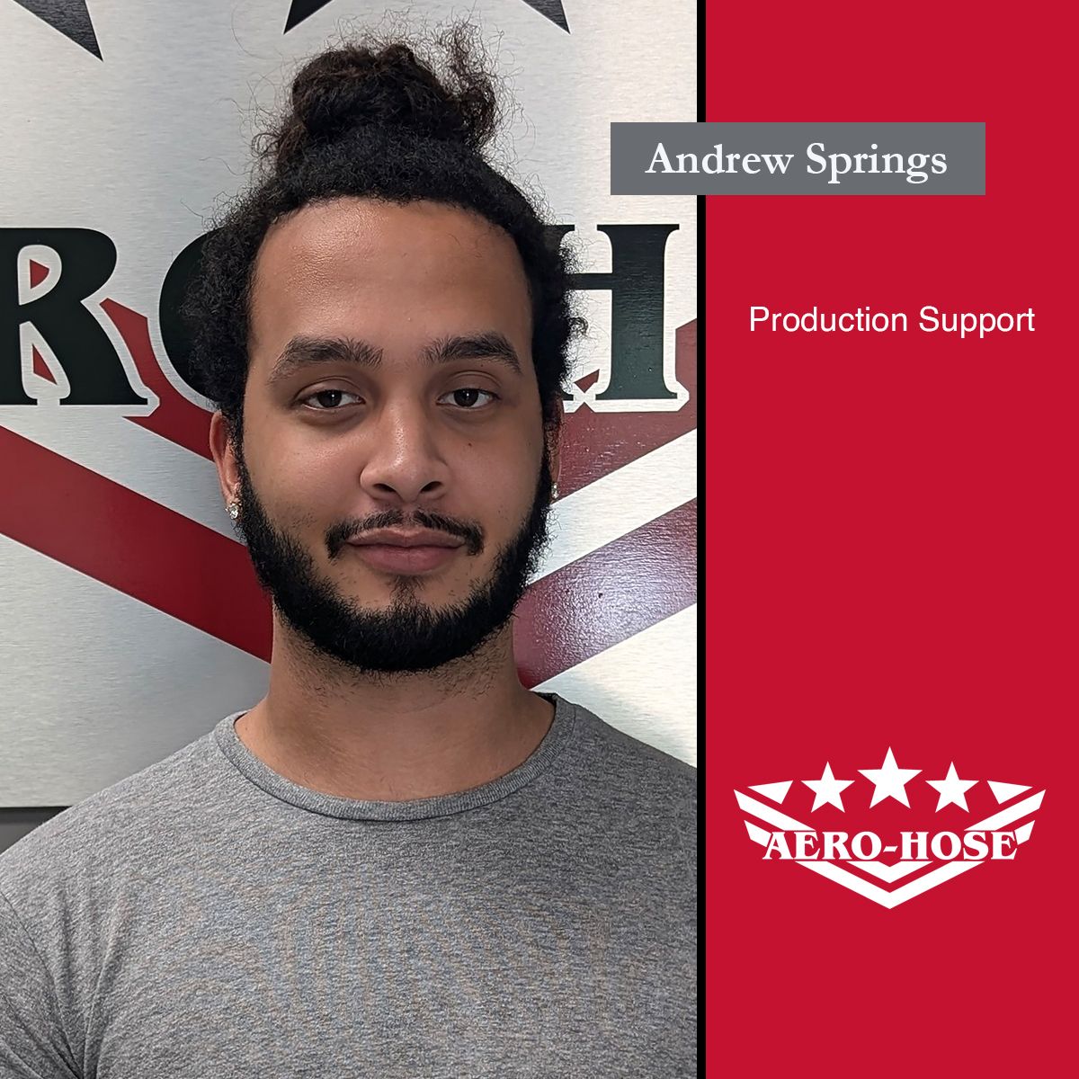 A man with a beard and a top bun stands in front of a red, white, and black background. Text on the image reads "Andrew Springs, Production Support, Aero-Hose - Auto Draft.