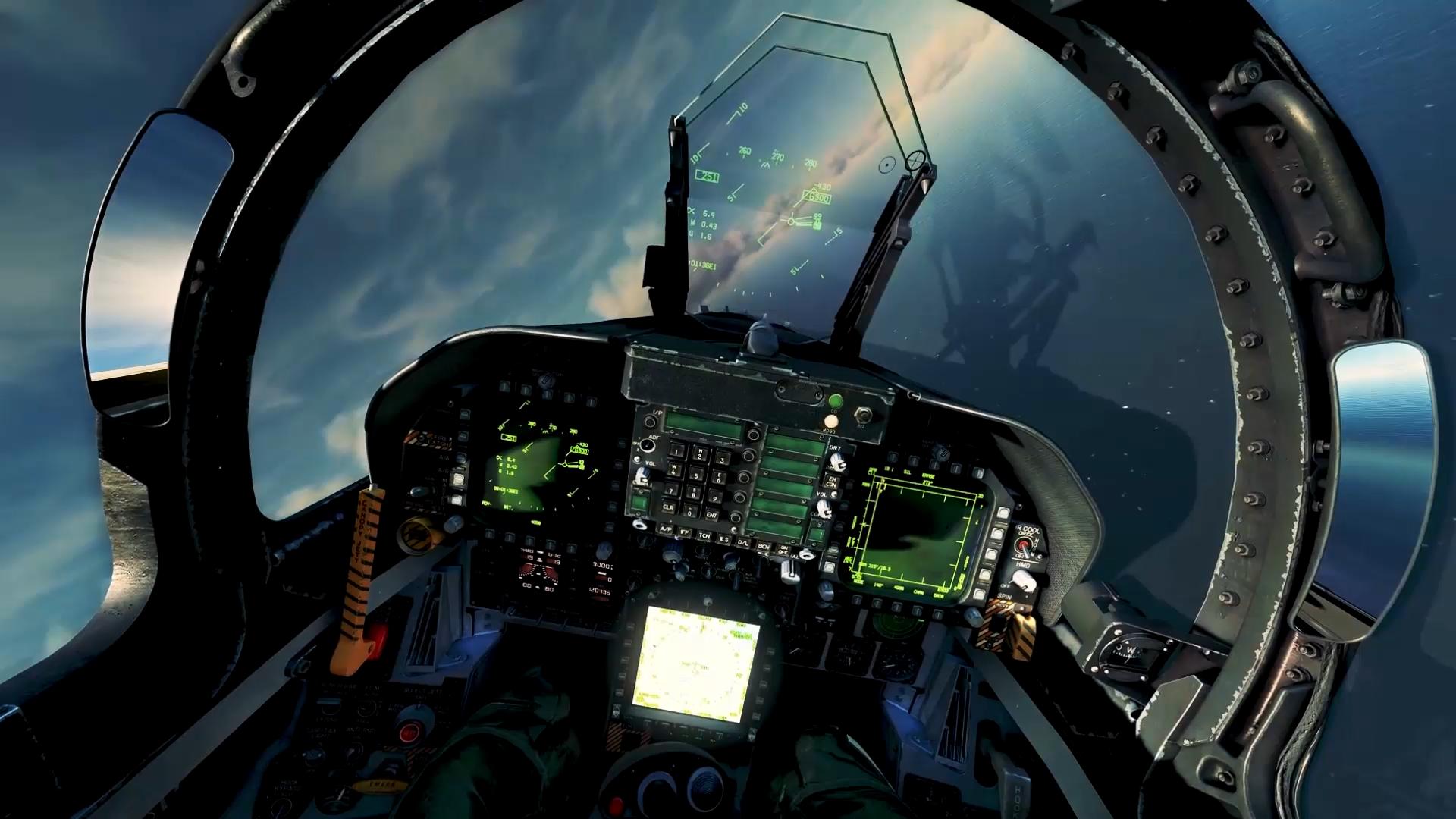 a view of the cockpit of a military fighter jet.